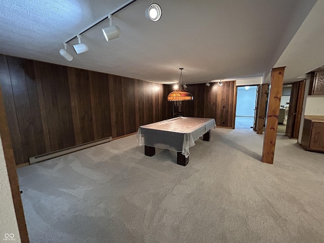 4675 N Riverside Dr, Columbus, IN 47203 - recreation room featuring baseboard heating, light carpet, track lighting, wood walls, and billiards
