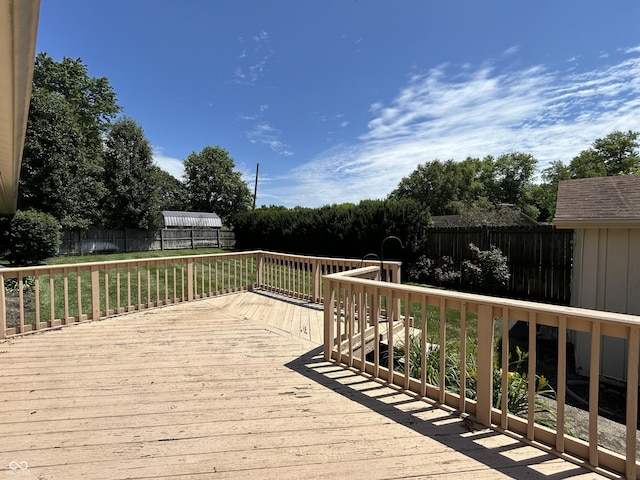 4675 N Riverside Dr, Columbus, IN 47203 - wooden deck featuring a fenced backyard