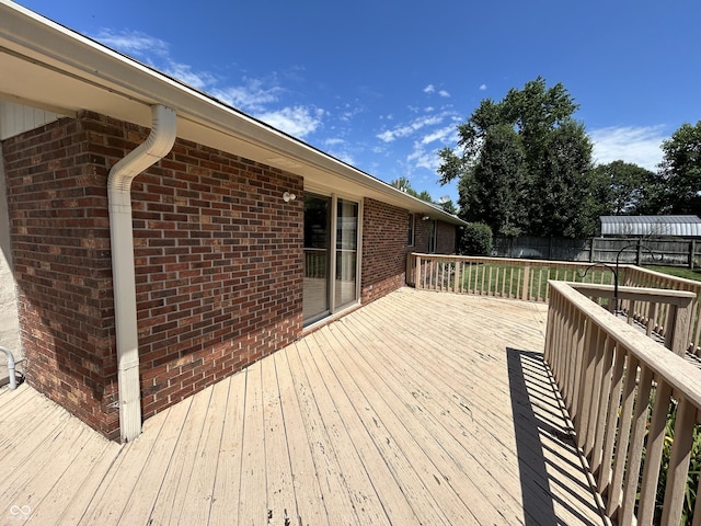 4675 N Riverside Dr, Columbus, IN 47203 - wooden deck with a fenced backyard