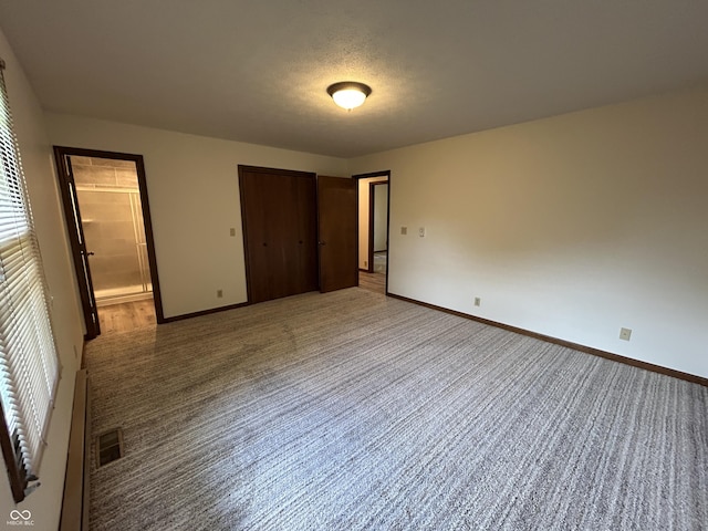 4675 N Riverside Dr, Columbus, IN 47203 - unfurnished bedroom with baseboards and a closet