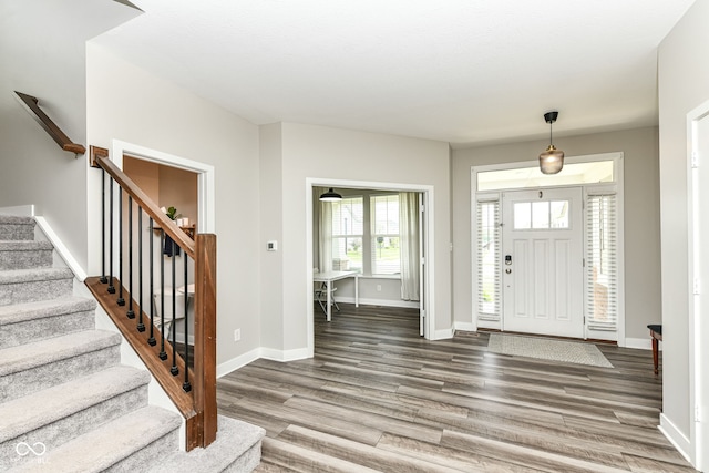 16502 Dominion Dr, Fishers, IN 46040 - foyer featuring wood finished floors and stairs