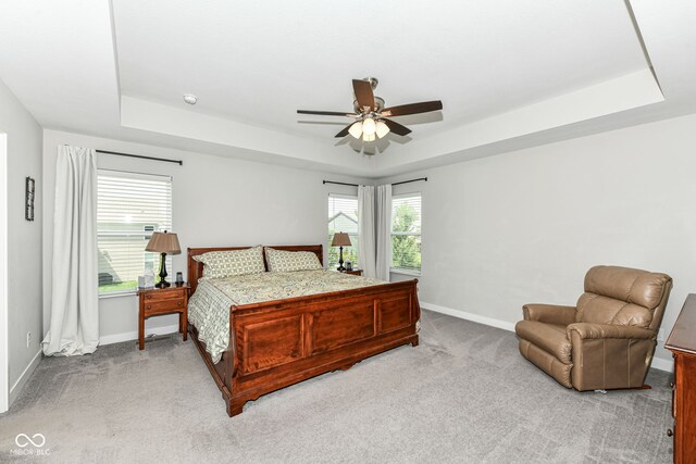 16502 Dominion Dr, Fishers, IN 46040 - carpeted bedroom featuring a raised ceiling and ceiling fan