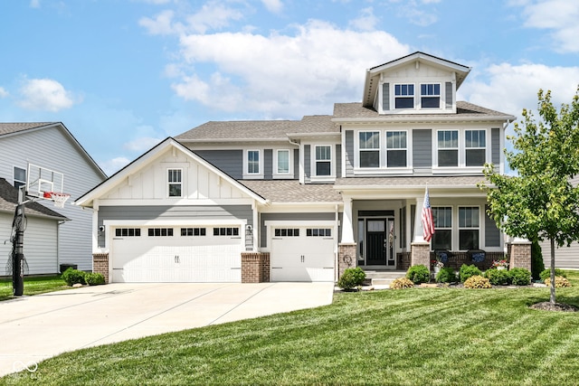 16502 Dominion Dr, Fishers, IN 46040 - view of front of house featuring driveway, a front yard, board and batten siding, brick siding, and a shingled roof