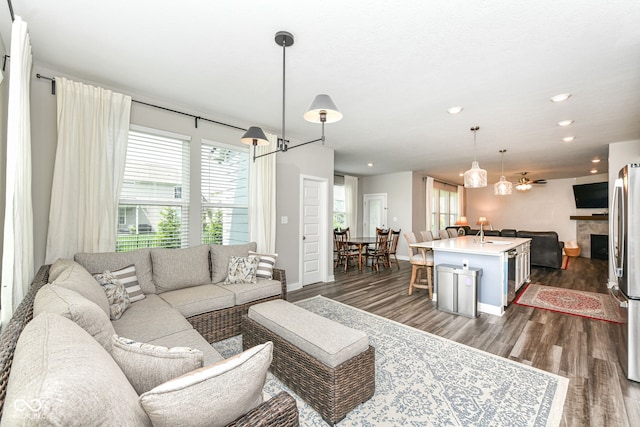 16502 Dominion Dr, Fishers, IN 46040 - living room with dark wood-style flooring, recessed lighting, and wine cooler