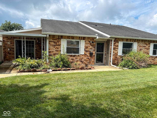 2770 Two Worlds Dr, Columbus, IN 47201 - single story home featuring brick siding and a front yard
