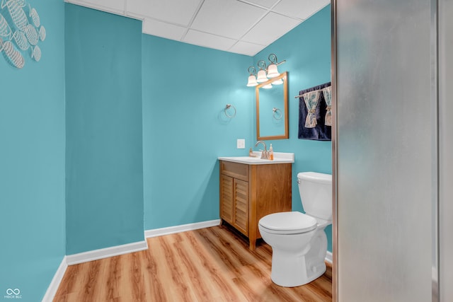 7830 Cross Crk, Avon, IN 46123 - bathroom with wood finished floors, vanity, and a drop ceiling