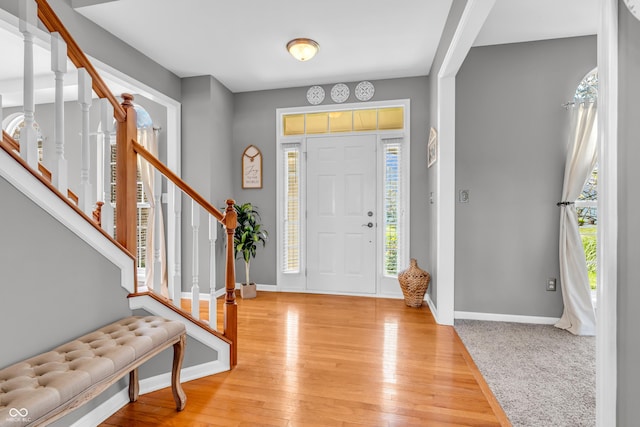7830 Cross Crk, Avon, IN 46123 - entryway featuring plenty of natural light, stairway, and light wood finished floors