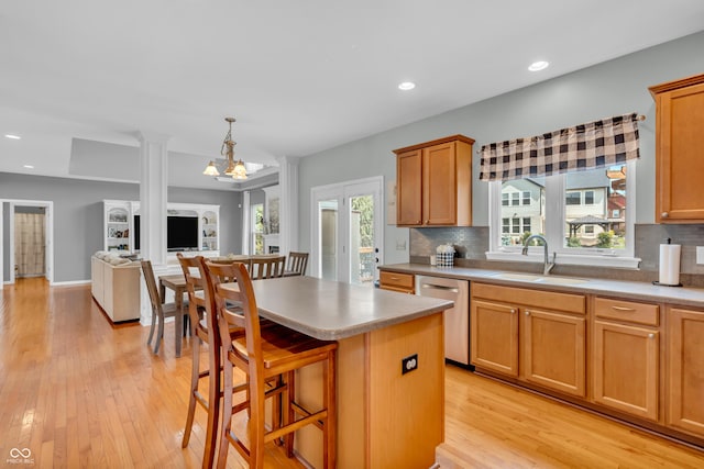 7830 Cross Crk, Avon, IN 46123 - kitchen featuring stainless steel dishwasher, backsplash, light wood finished floors, and recessed lighting