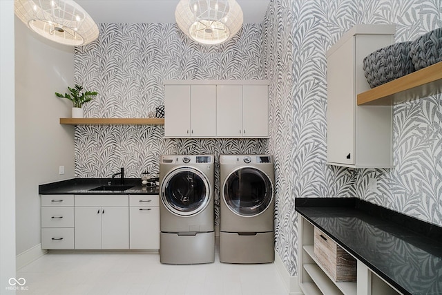 1269 Chatham Rdg Ct, Westfield, IN 46074 - washroom featuring wallpapered walls, separate washer and dryer, and cabinet space