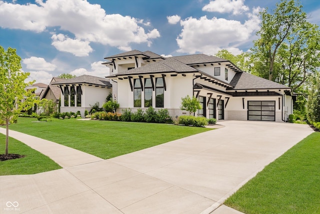 1269 Chatham Rdg Ct, Westfield, IN 46074 - prairie-style house featuring stucco siding, concrete driveway, an attached garage, and a front yard