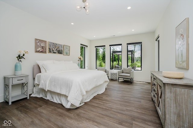 1269 Chatham Rdg Ct, Westfield, IN 46074 - bedroom featuring dark wood-style flooring, recessed lighting, and a chandelier