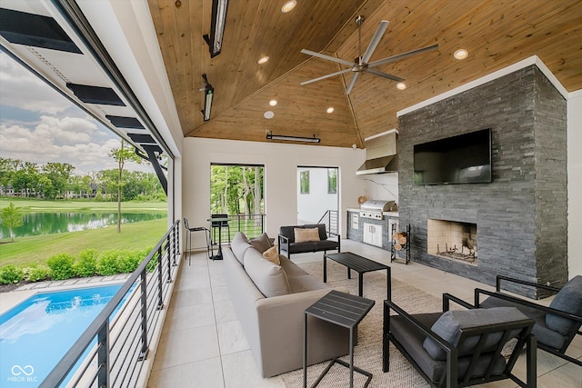 1269 Chatham Rdg Ct, Westfield, IN 46074 - view of patio with a water view, ceiling fan, an outdoor living space with a fireplace, a gazebo, and area for grilling