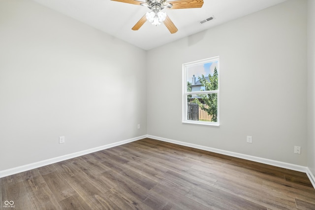 12404 Titans Dr, Fishers, IN 46037 - spare room with dark wood-style flooring and ceiling fan