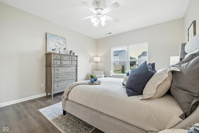 12404 Titans Dr, Fishers, IN 46037 - bedroom featuring dark wood-style flooring and a ceiling fan