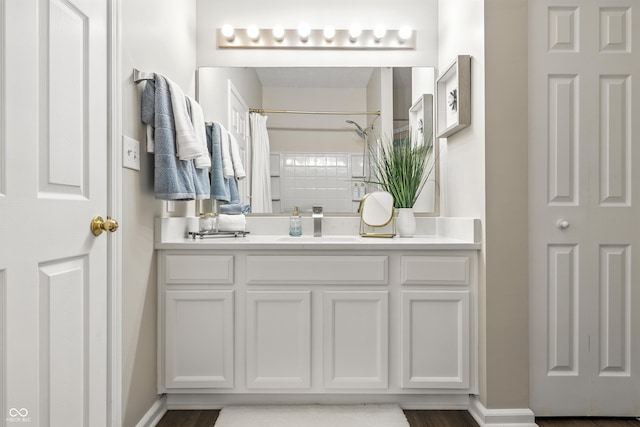 12404 Titans Dr, Fishers, IN 46037 - bathroom featuring curtained shower and vanity