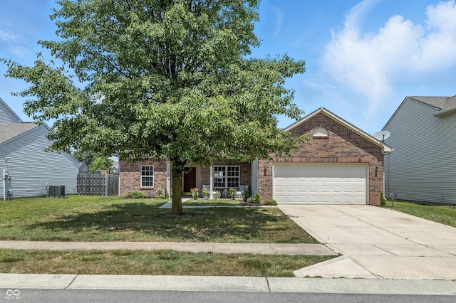 12404 Titans Dr, Fishers, IN 46037 - view of property hidden behind natural elements with brick siding, an attached garage, and driveway