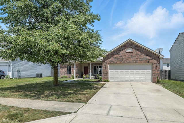12404 Titans Dr, Fishers, IN 46037 - view of front facade with brick siding, a front lawn, an attached garage, and driveway