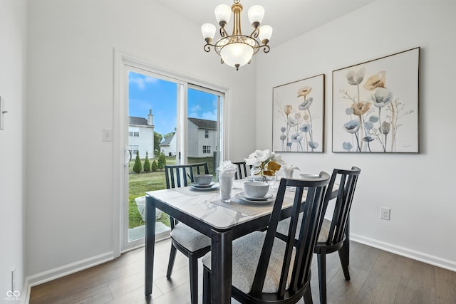 12404 Titans Dr, Fishers, IN 46037 - dining room with a chandelier and wood finished floors