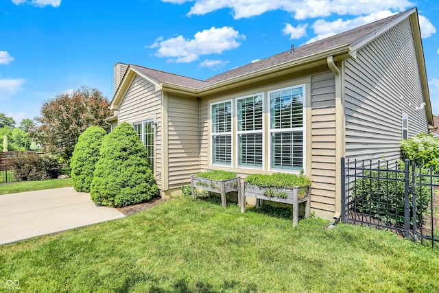 16130 Matlock Cir, Westfield, IN 46074 - view of home's exterior with a chimney and a patio