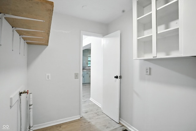 4765 E 200 N, Anderson, IN 46012 - laundry area with light wood-style floors and baseboards