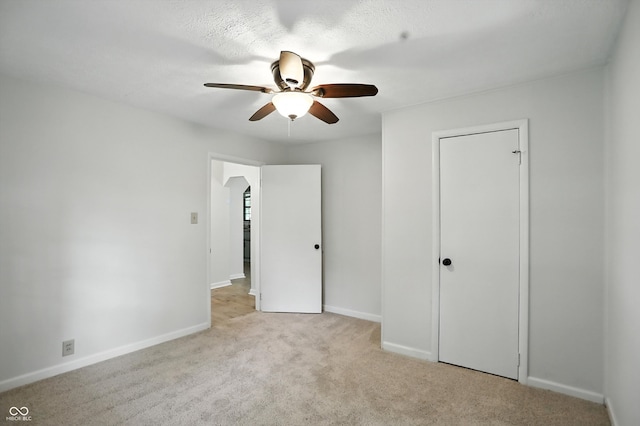 4765 E 200 N, Anderson, IN 46012 - unfurnished bedroom with carpet and ceiling fan