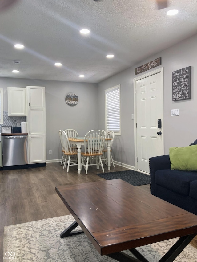 2822 Tindall St, Indianapolis, IN 46203 - living room featuring recessed lighting, a textured ceiling, and dark wood-type flooring