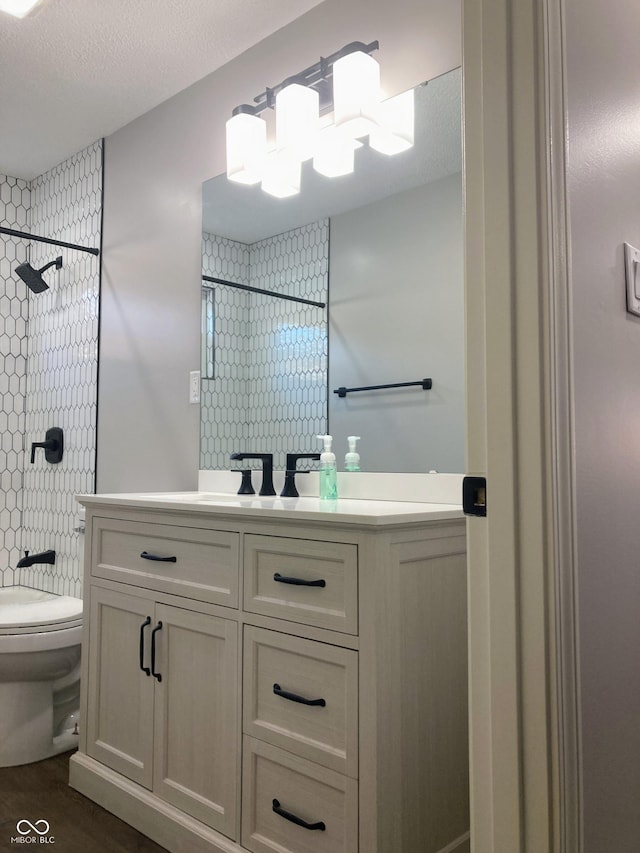 2822 Tindall St, Indianapolis, IN 46203 - bathroom featuring a shower, vanity, wood finished floors, and a chandelier