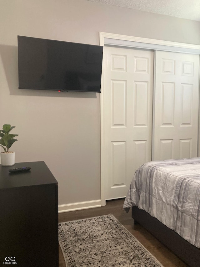 2822 Tindall St, Indianapolis, IN 46203 - bedroom featuring a closet and baseboards