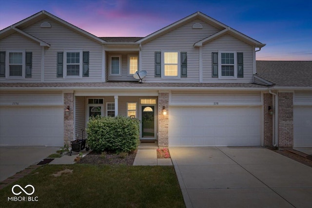 1158 Thistlewood Way, Plainfield, IN 46168 - multi unit property featuring a garage, driveway, a shingled roof, and brick siding