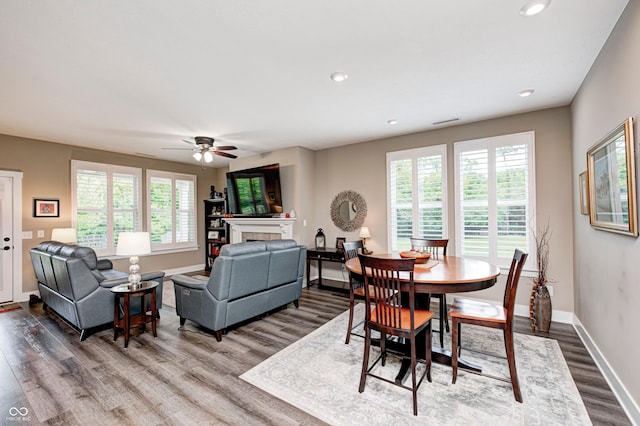 1432 Hideaway Cir, Brownsburg, IN 46112 - dining room with dark wood finished floors, recessed lighting, ceiling fan, and a tiled fireplace