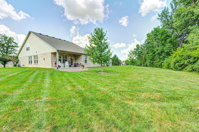 1432 Hideaway Cir, Brownsburg, IN 46112 - view of green lawn featuring a patio