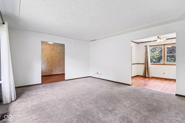 1441 N 700 W, Greenfield, IN 46140 - carpeted empty room featuring a textured ceiling and ceiling fan
