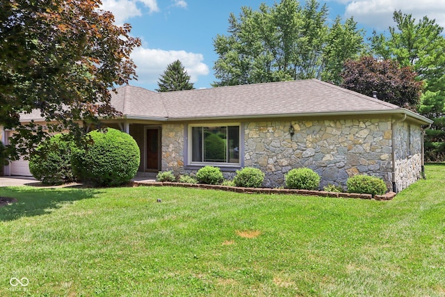 1441 N 700 W, Greenfield, IN 46140 - view of front of house with stone siding, a front yard, and a shingled roof