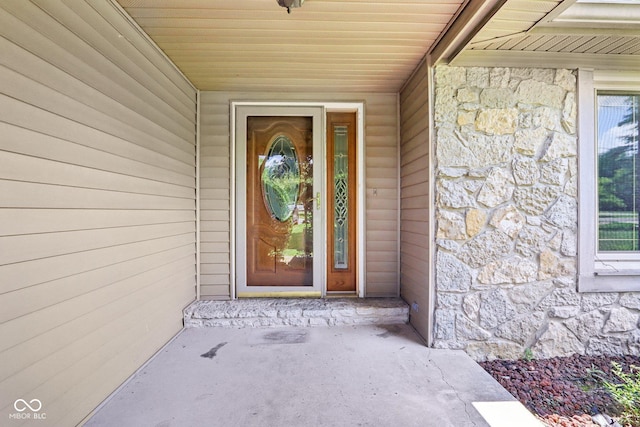 1441 N 700 W, Greenfield, IN 46140 - doorway to property featuring stone siding