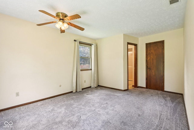 1441 N 700 W, Greenfield, IN 46140 - unfurnished bedroom featuring carpet, a textured ceiling, and a ceiling fan