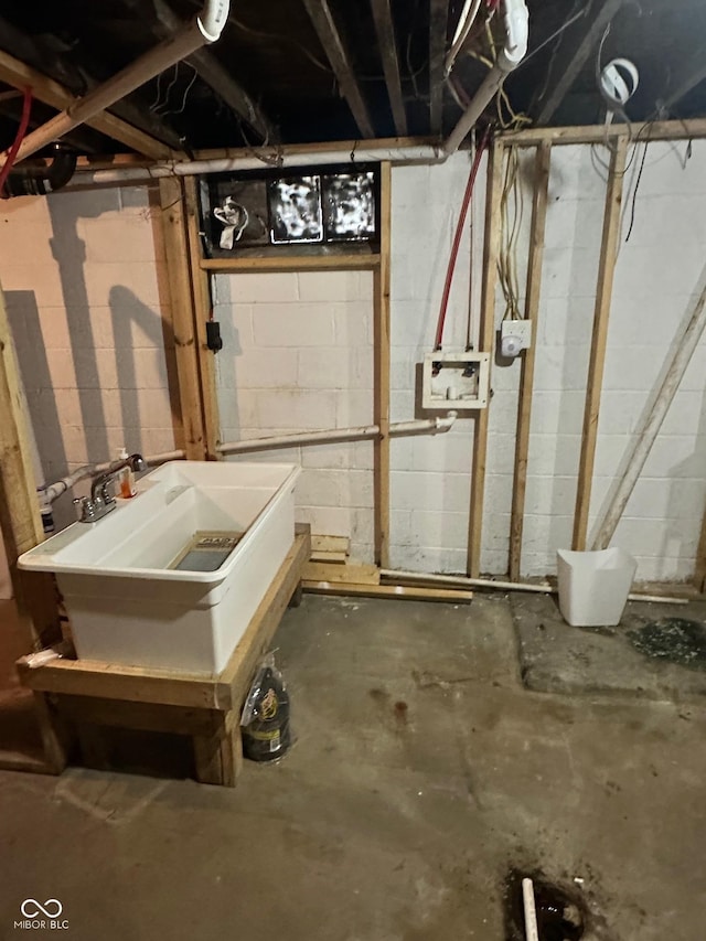 3711 Hillside Ave, Indianapolis, IN 46218 - unfinished basement with a sink