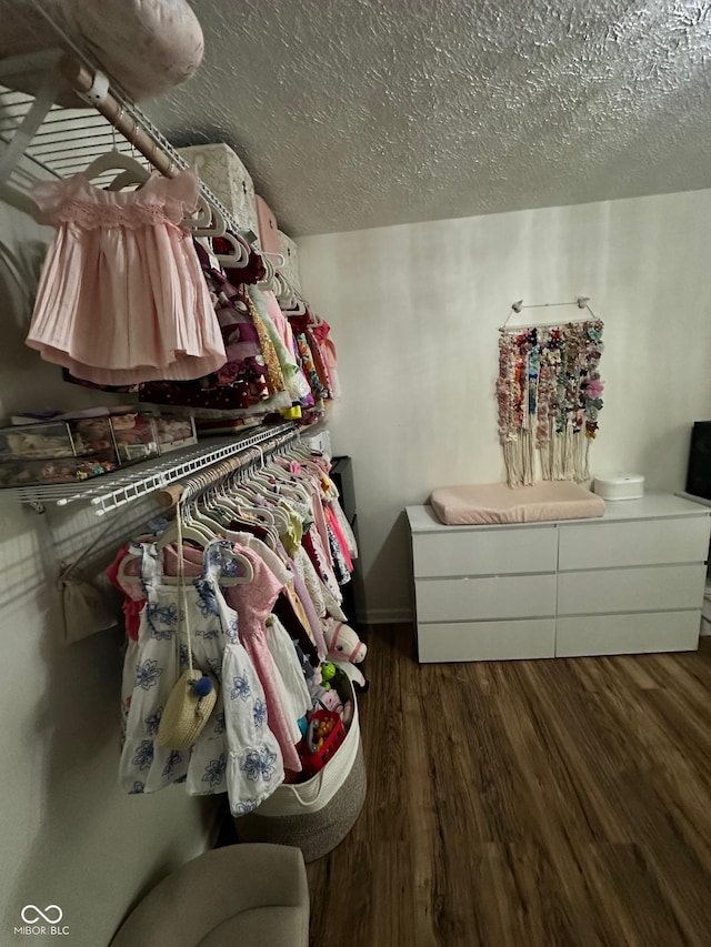 3711 Hillside Ave, Indianapolis, IN 46218 - walk in closet featuring wood finished floors