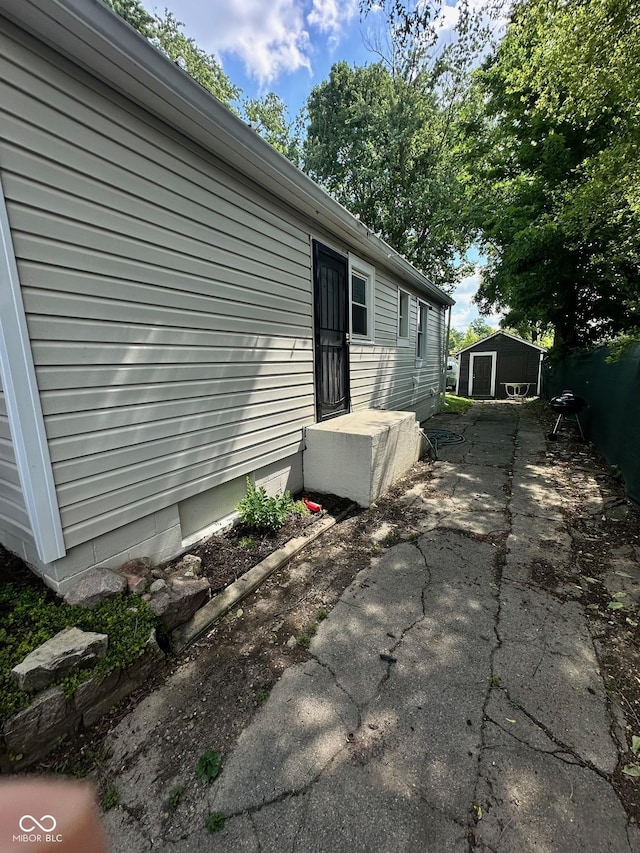 3711 Hillside Ave, Indianapolis, IN 46218 - view of home's exterior with a storage shed