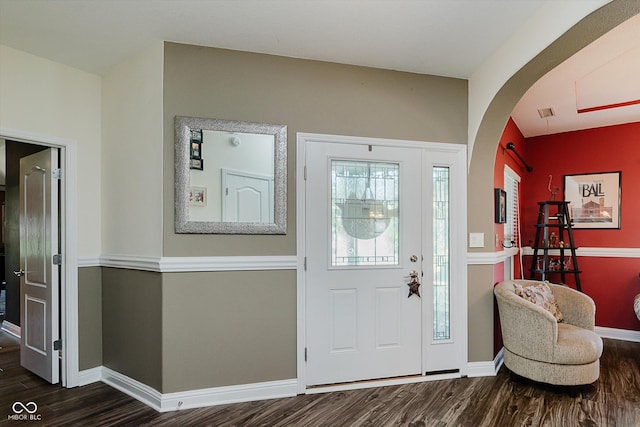 7092 Bridgemont Ct, Avon, IN 46123 - foyer entrance featuring arched walkways and dark wood-type flooring