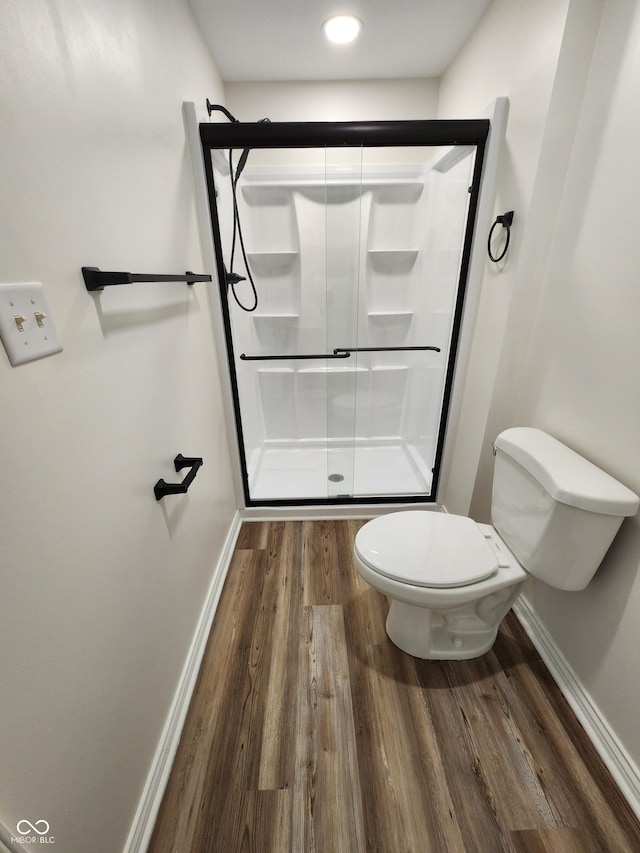 4536 Clayburn Dr, Indianapolis, IN 46268 - bathroom with wood finished floors and a shower stall