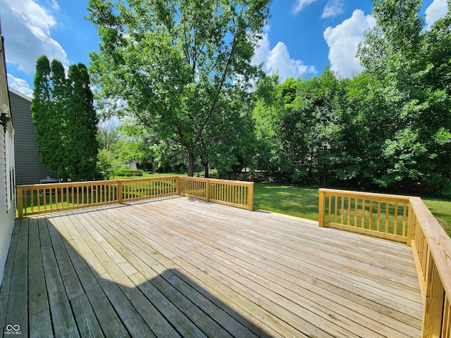 4536 Clayburn Dr, Indianapolis, IN 46268 - deck featuring a yard and view of scattered trees