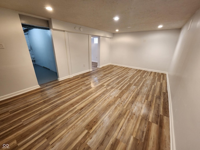 4536 Clayburn Dr, Indianapolis, IN 46268 - finished basement featuring recessed lighting and wood finished floors