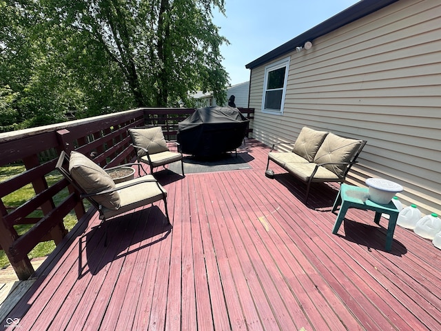 7607 Ardwell Ct, Indianapolis, IN 46237 - deck with an outdoor hangout area and a grill