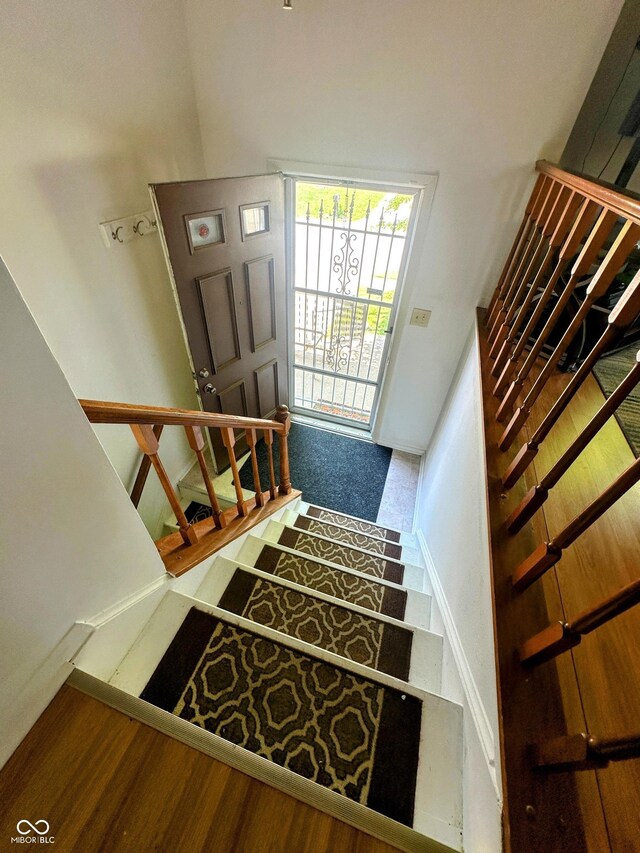 7607 Ardwell Ct, Indianapolis, IN 46237 - stairway with wood finished floors and baseboards