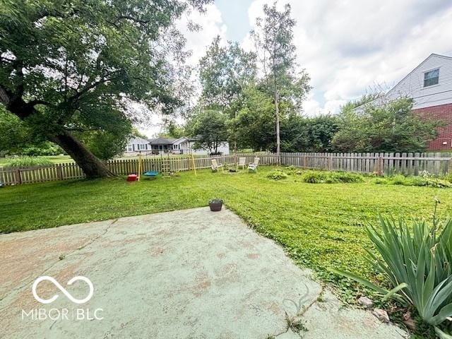 6546 Derbyshire Rd, Indianapolis, IN 46227 - fenced backyard featuring a patio