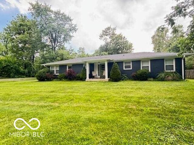 6546 Derbyshire Rd, Indianapolis, IN 46227 - ranch-style house with a front yard