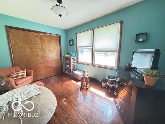 6546 Derbyshire Rd, Indianapolis, IN 46227 - living room featuring dark wood finished floors