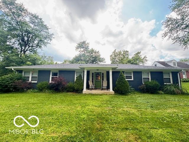 6546 Derbyshire Rd, Indianapolis, IN 46227 - view of front of home with a front yard
