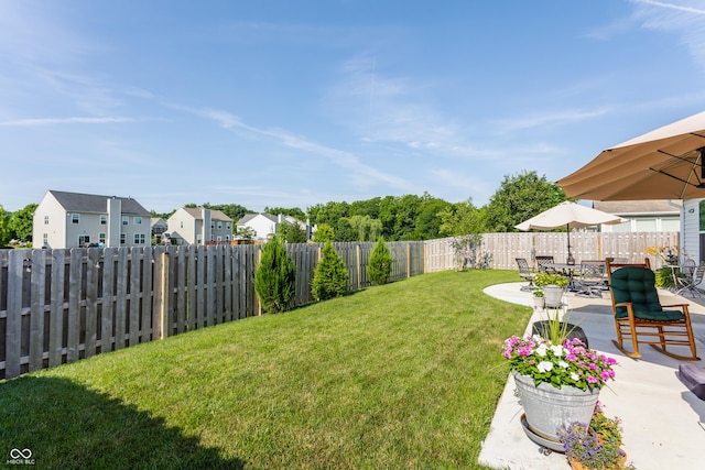 10585 Windward Dr, Indianapolis, IN 46234 - fenced backyard with a patio and a residential view