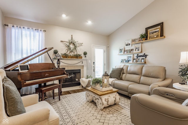 10585 Windward Dr, Indianapolis, IN 46234 - living room with lofted ceiling, recessed lighting, a fireplace, and wood finished floors